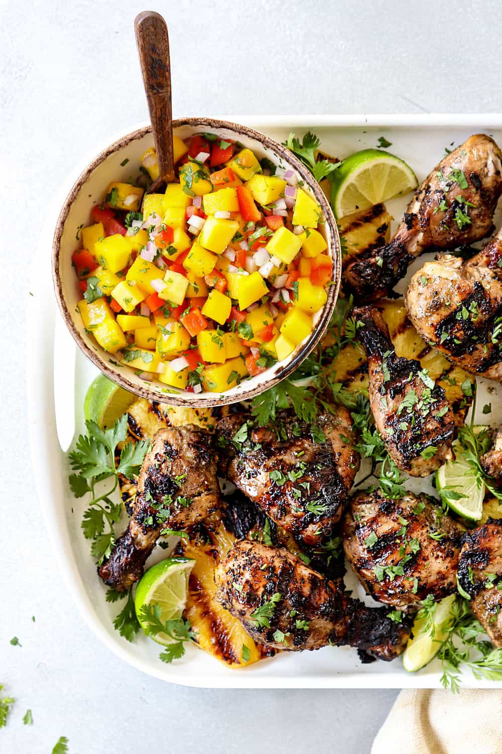 top view of Jamaican Jerk Chicken on a white platter