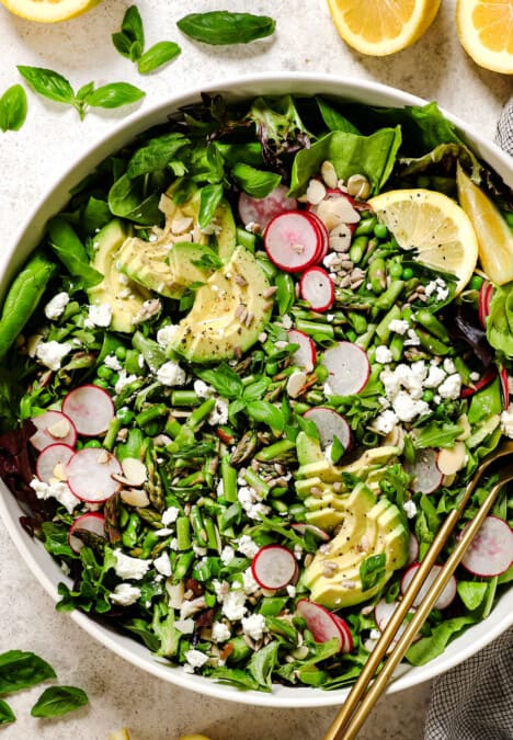 top view of spring salad recipe in a bowl with lemon basil vinaigrette