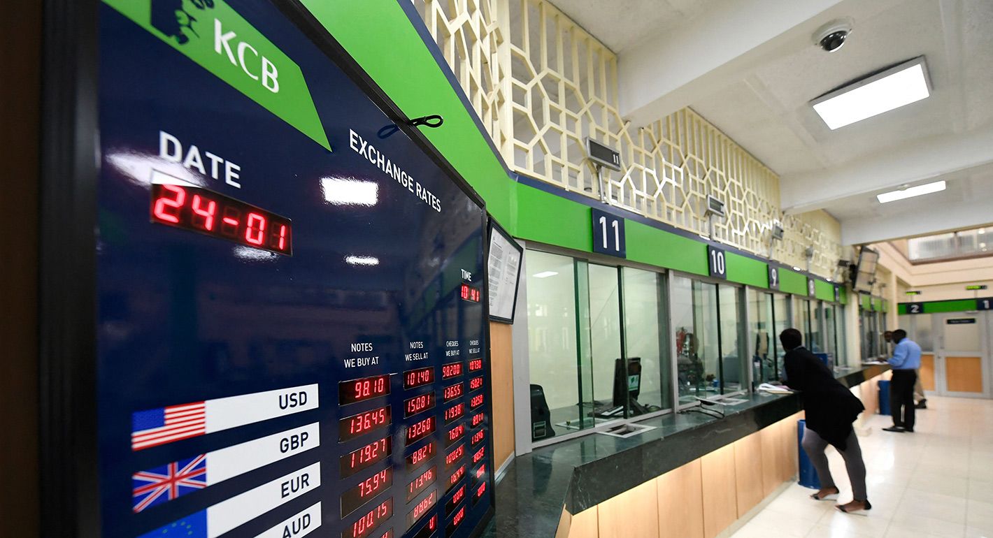 A customer is served at the Kenya Commercial Bank (KCB) in Nairobi on January 24, 2018.