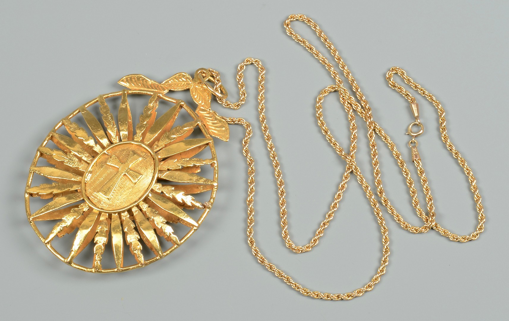 Lot 83: 18K gold Medallion, 14K 31" Necklace