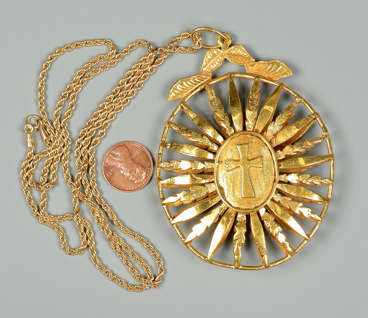 Lot 83: 18K gold Medallion, 14K 31" Necklace