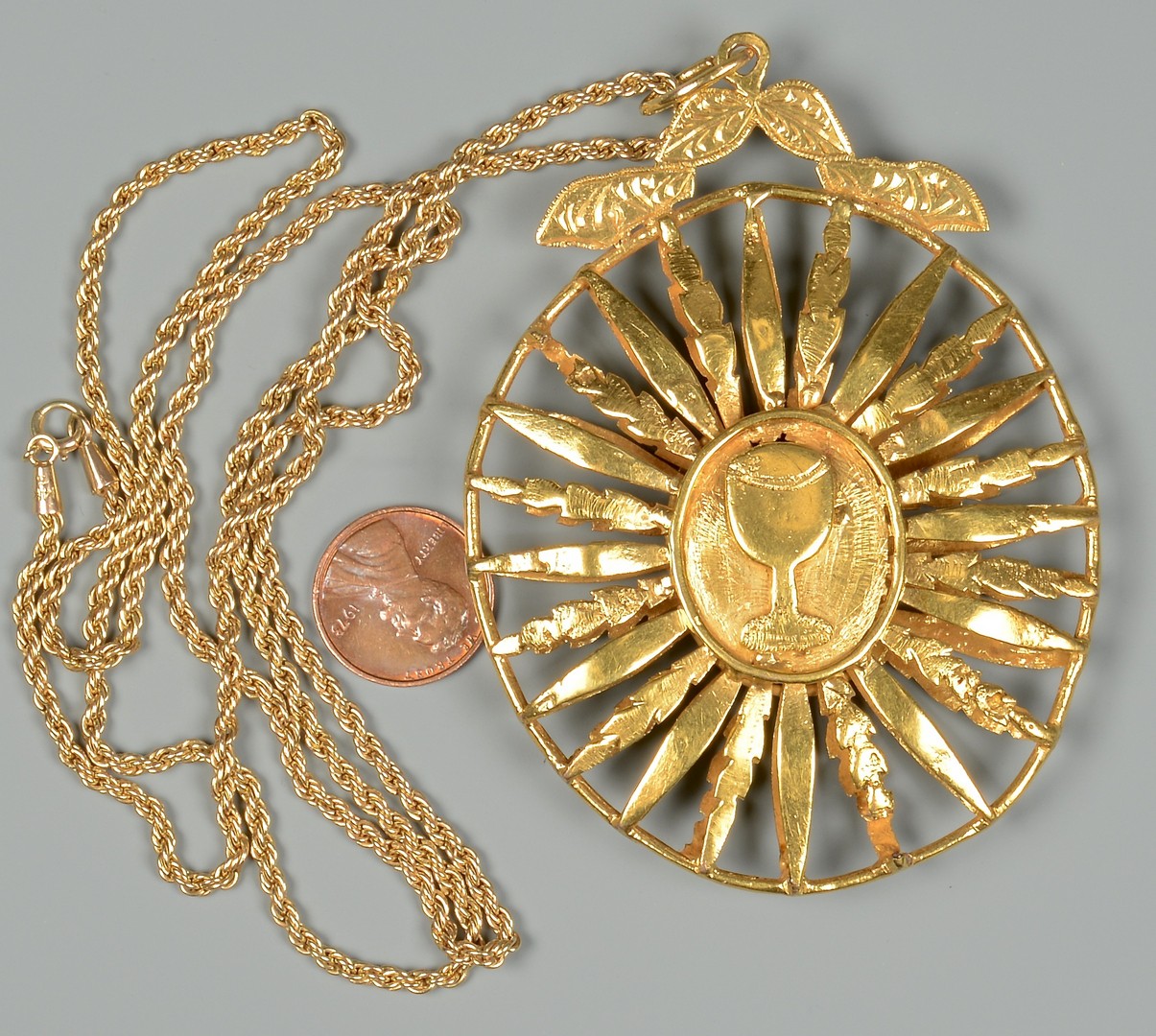 Lot 83: 18K gold Medallion, 14K 31" Necklace