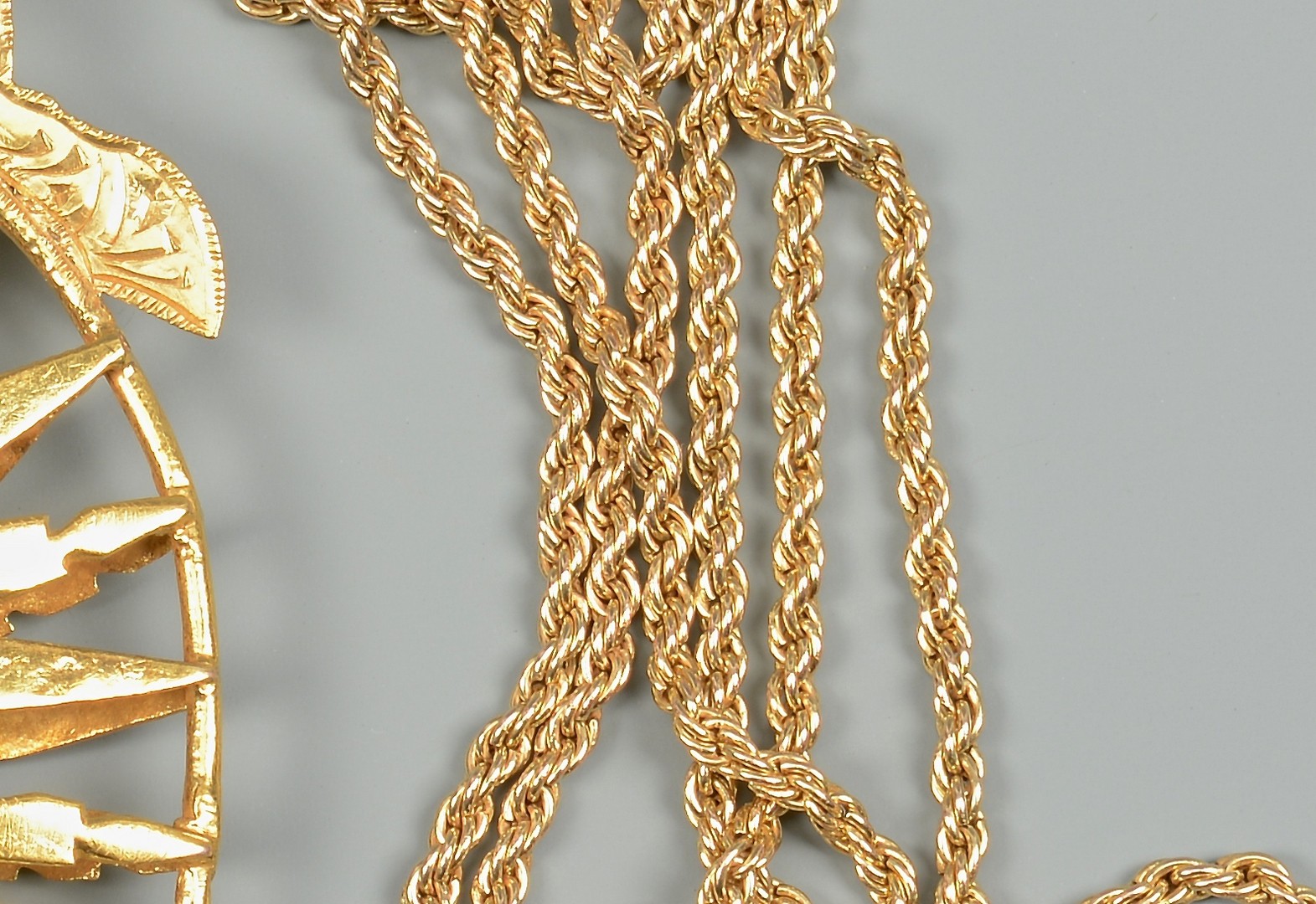 Lot 83: 18K gold Medallion, 14K 31" Necklace