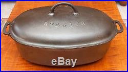 GRISWOLD CAST IRON # 5 OVAL ROASTER WITH LID AND TRIVET