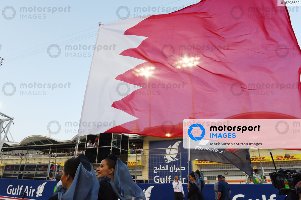 F1 Flag, Bahrain National Flag and FIA Flag on the grid at Formula One ...