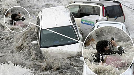 And here's me in the middle of a tsunami: The photographer caught up in tidal wave... who carried on taking pictures