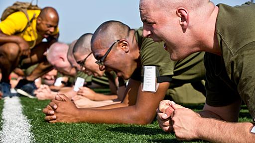 Did lower back injuries drive the commandant’s decision on planks?