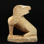 Monumental Archaic Greek Limestone Statue of a Sphinx