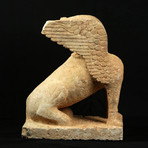 Monumental Archaic Greek Limestone Statue of a Sphinx