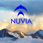 A company logo is superimposed over a cloud-swollen mountaintop.