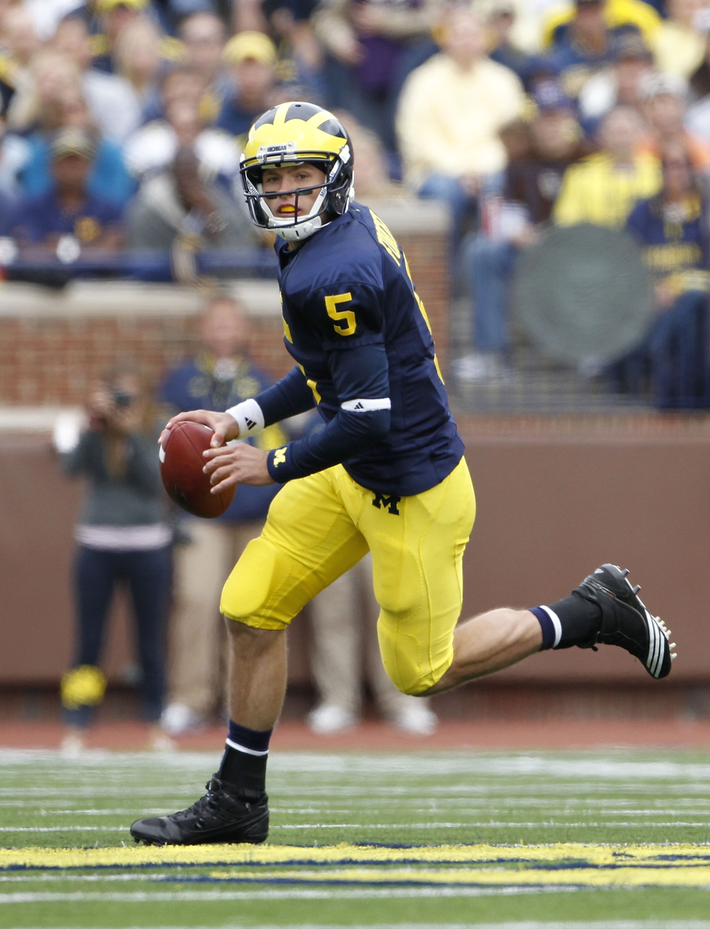 Tate Forcier threw two touchdown passes in last year's game, but his overtime pick allowed  Michigan state to escape with a 26-20 win.