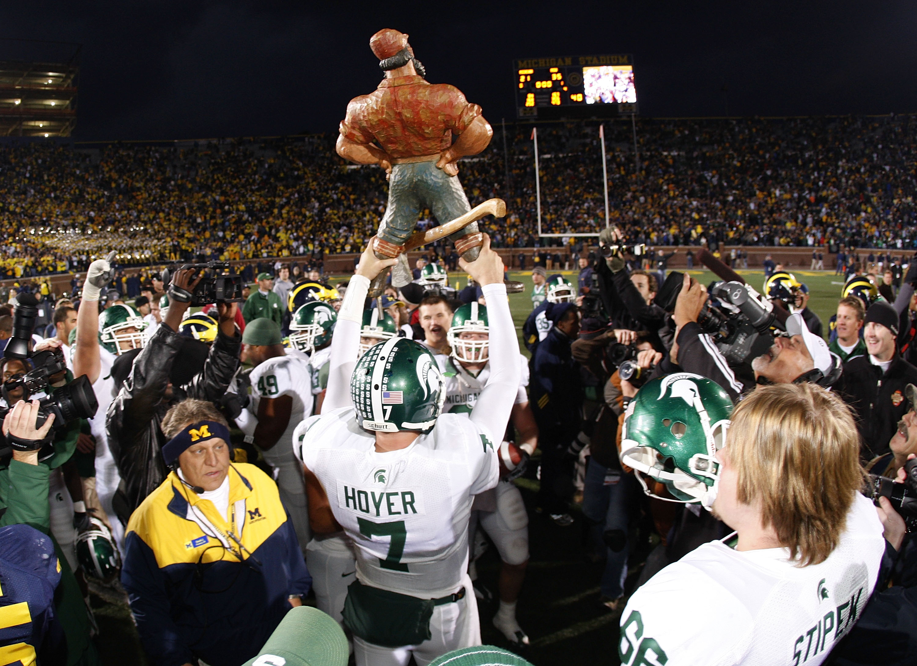 Michigan State quarterback Brian Hoyer hoists the Bunyan trophy Michigan State defeats Michigan 37-21 in the 2008 contest at Ann Arbor.after