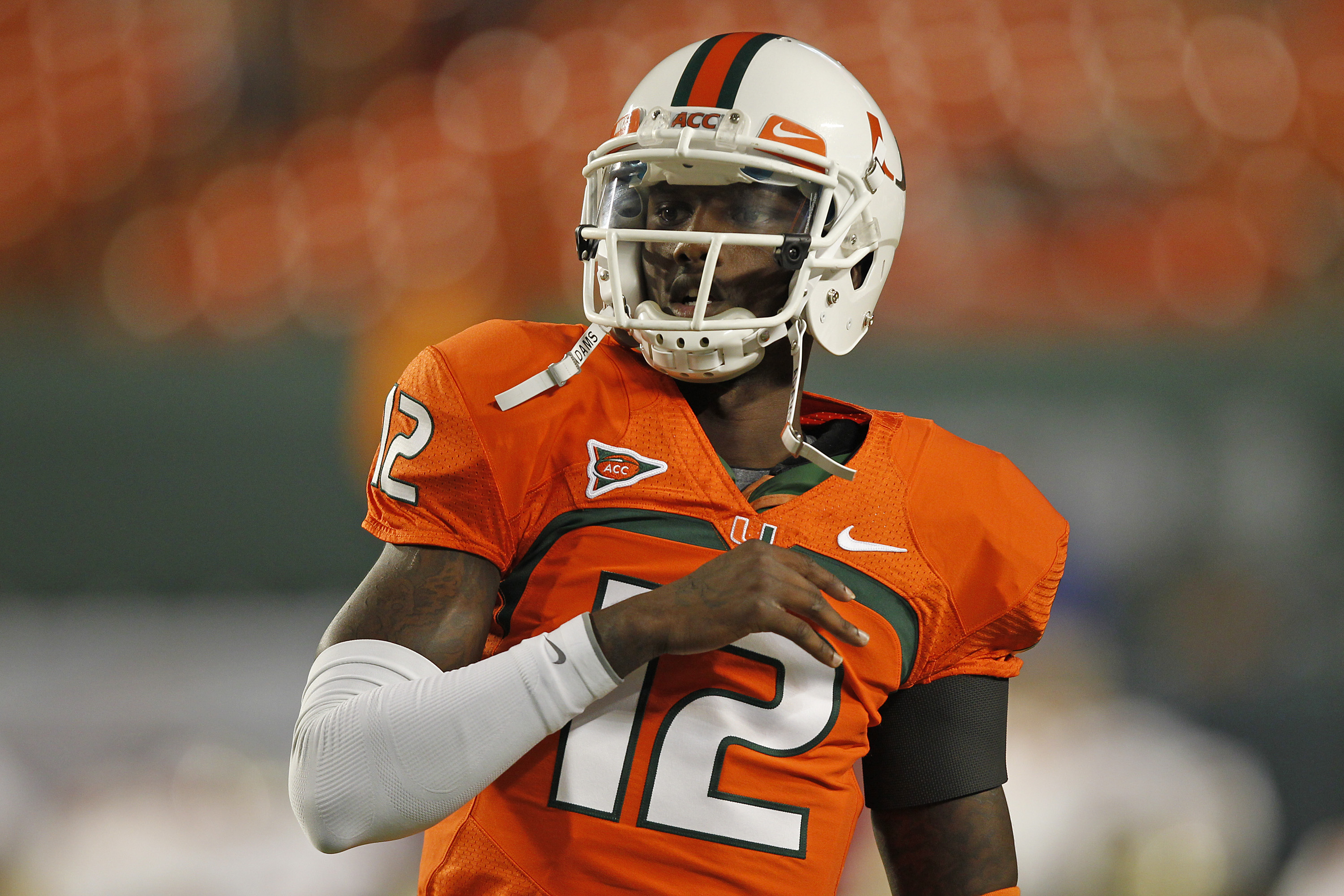 MIAMI, FL - OCTOBER 9: Jacory Harris #12 of the Miami Hurricanes warms up prior to the game against the Florida State Seminoles on October 9, 2010 at Sun Life Stadium in Miami, Florida. (Photo by Joel Auerbach/Getty Images)