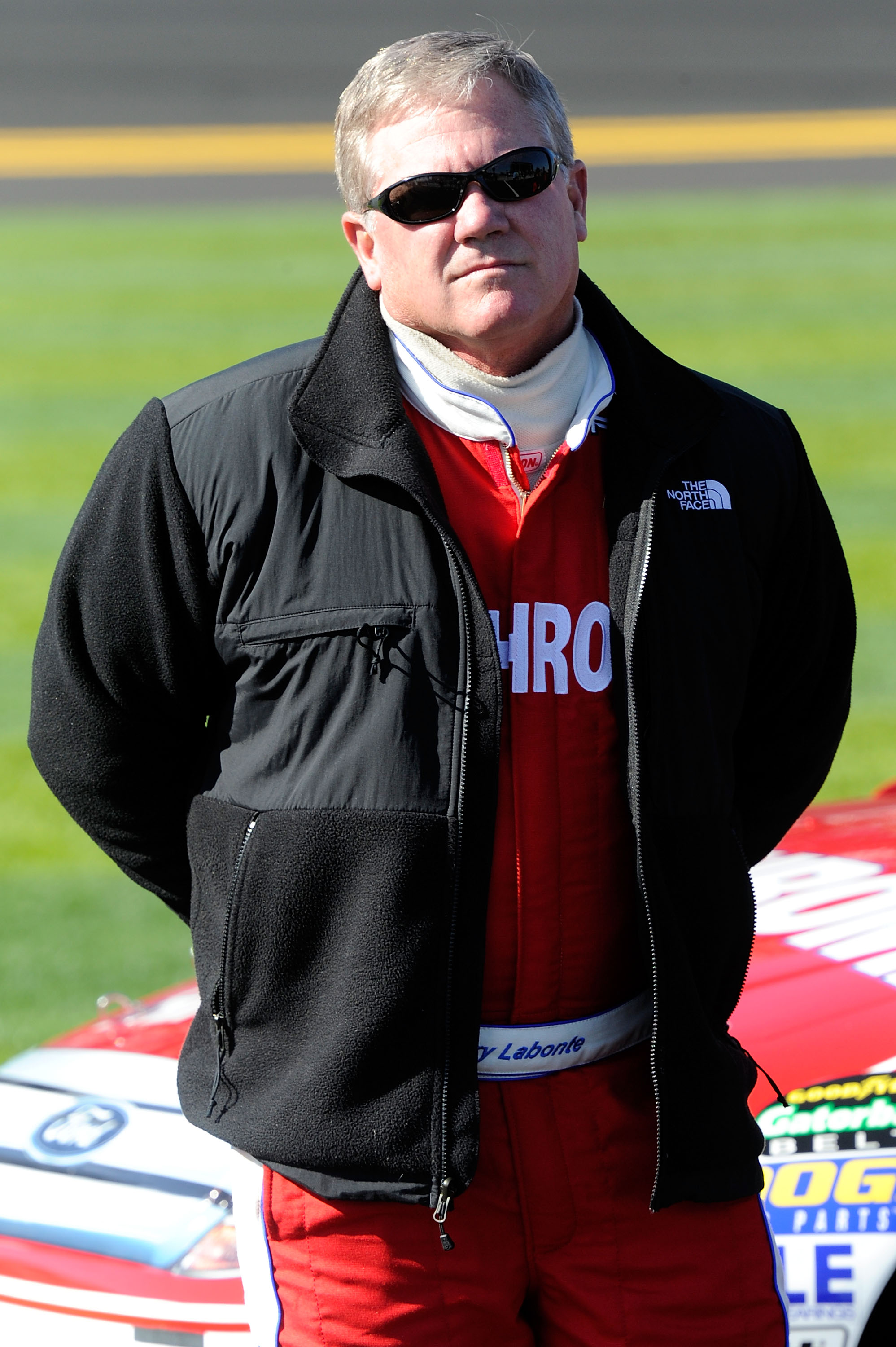 DAYTONA BEACH, FL - FEBRUARY 13:  Terry Labonte, driver of the #32 U.S. Chrome Ford, stands on pit road during qualifying for the NASCAR Sprint Cup Series Daytona 500 at Daytona International Speedway on February 13, 2011 in Daytona Beach, Florida.  (Phot