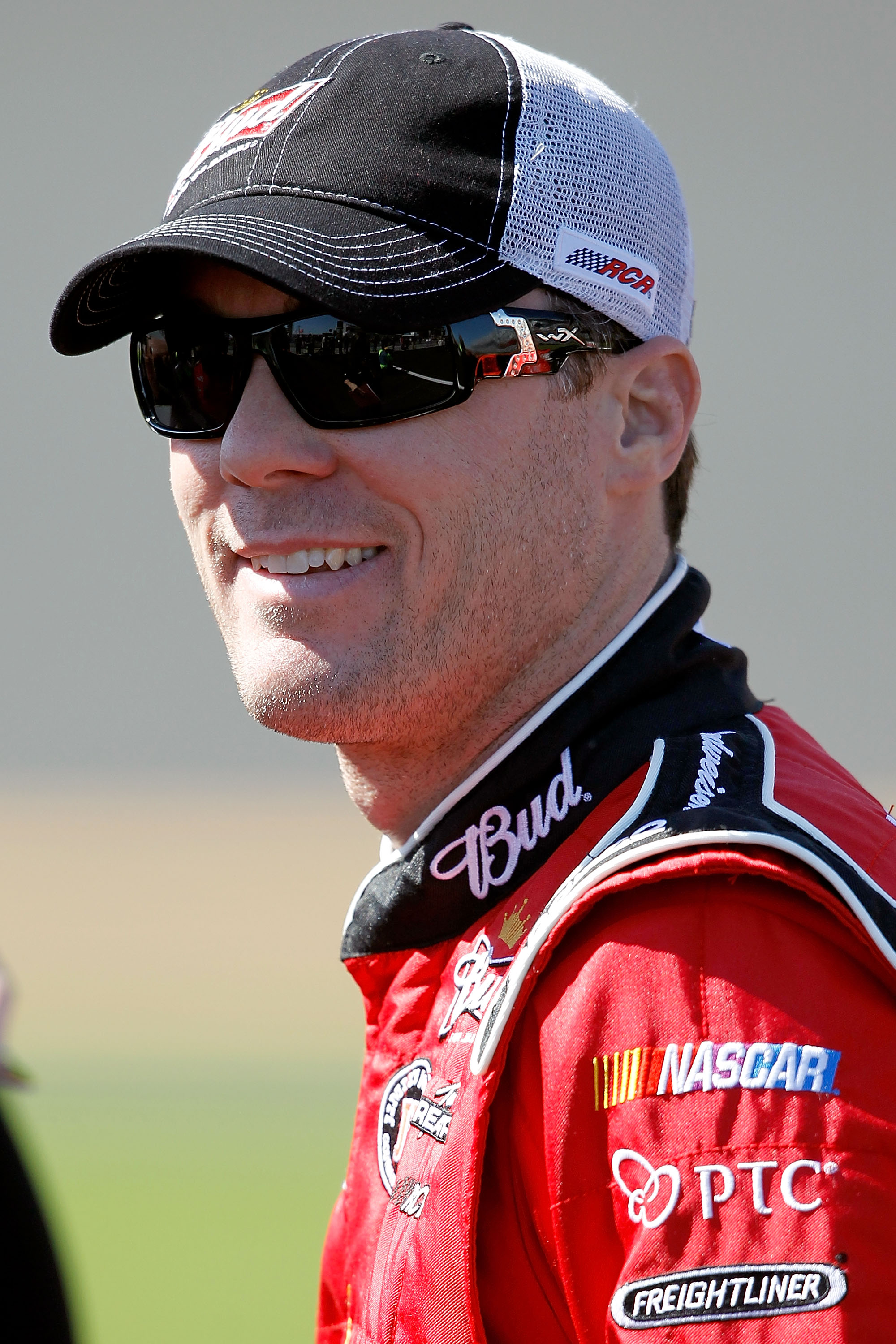 DAYTONA BEACH, FL - FEBRUARY 13:  Kevin Harvick, driver of the #29 Budweiser Chevrolet, stands on the grid during qualifying for the NASCAR Sprint Cup Series Daytona 500 at Daytona International Speedway on February 13, 2011 in Daytona Beach, Florida.  (P