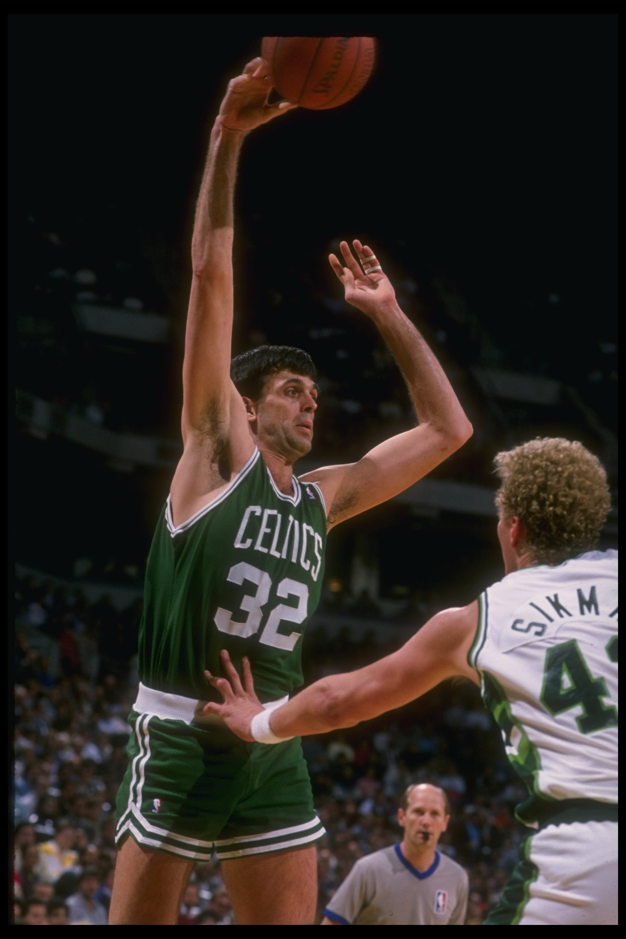 Forward Kevin McHale of the Boston Celtics shoots the ball during a game versus the Milwaukee Bucks at the Bradley Center in Milwaukee, Wisconsin.