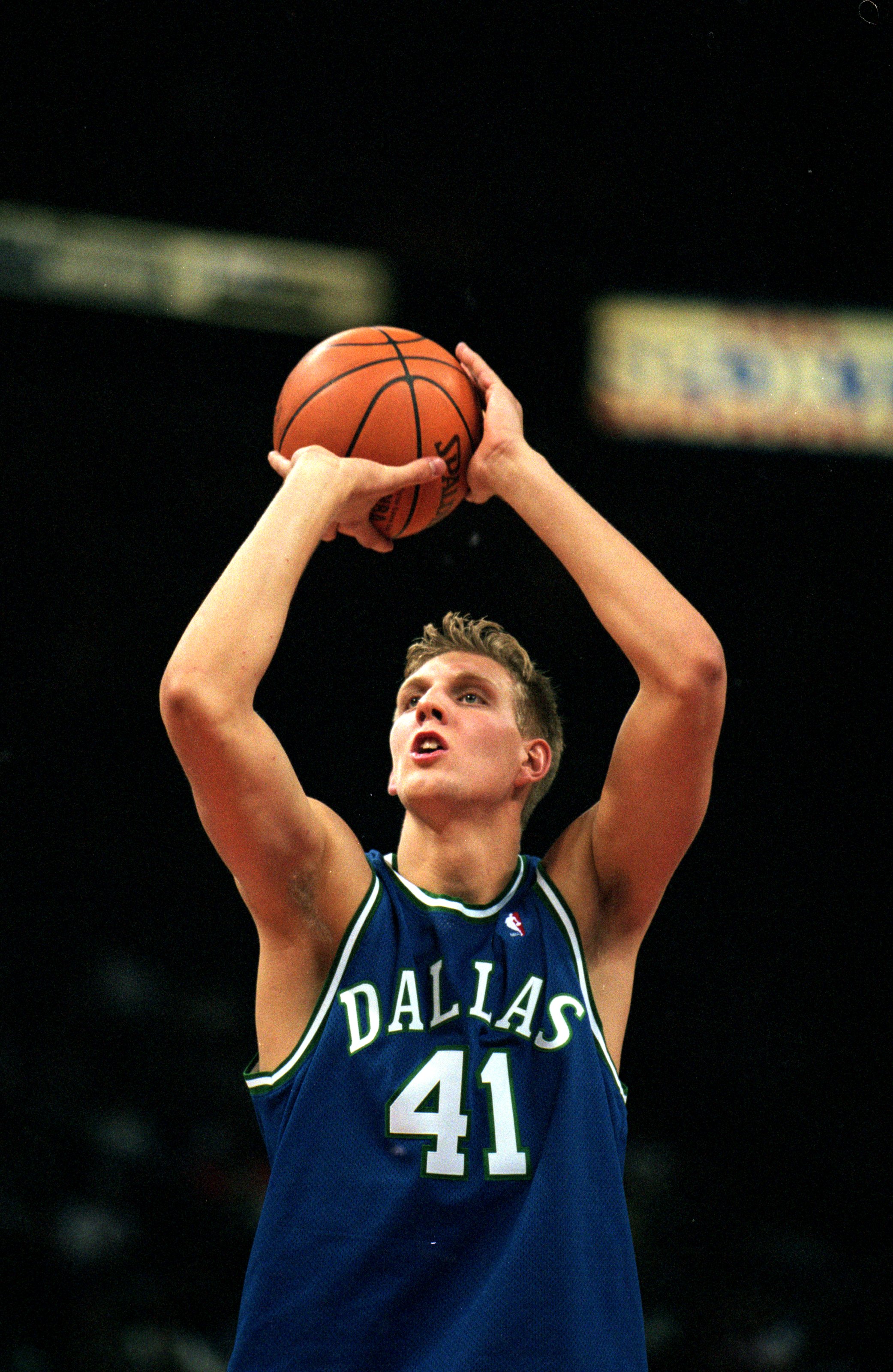 23 Oct 1999:  Dirk Nowitzki #41 of the Dallas Mavericks makes a free throw during the game against the Charlotte Hornets at the Charlotte Coliseum in Charlotte, North Carolina. The Hornets defeated the Mavericks 126-110.  Mandatory Credit: Craig Jones  /A