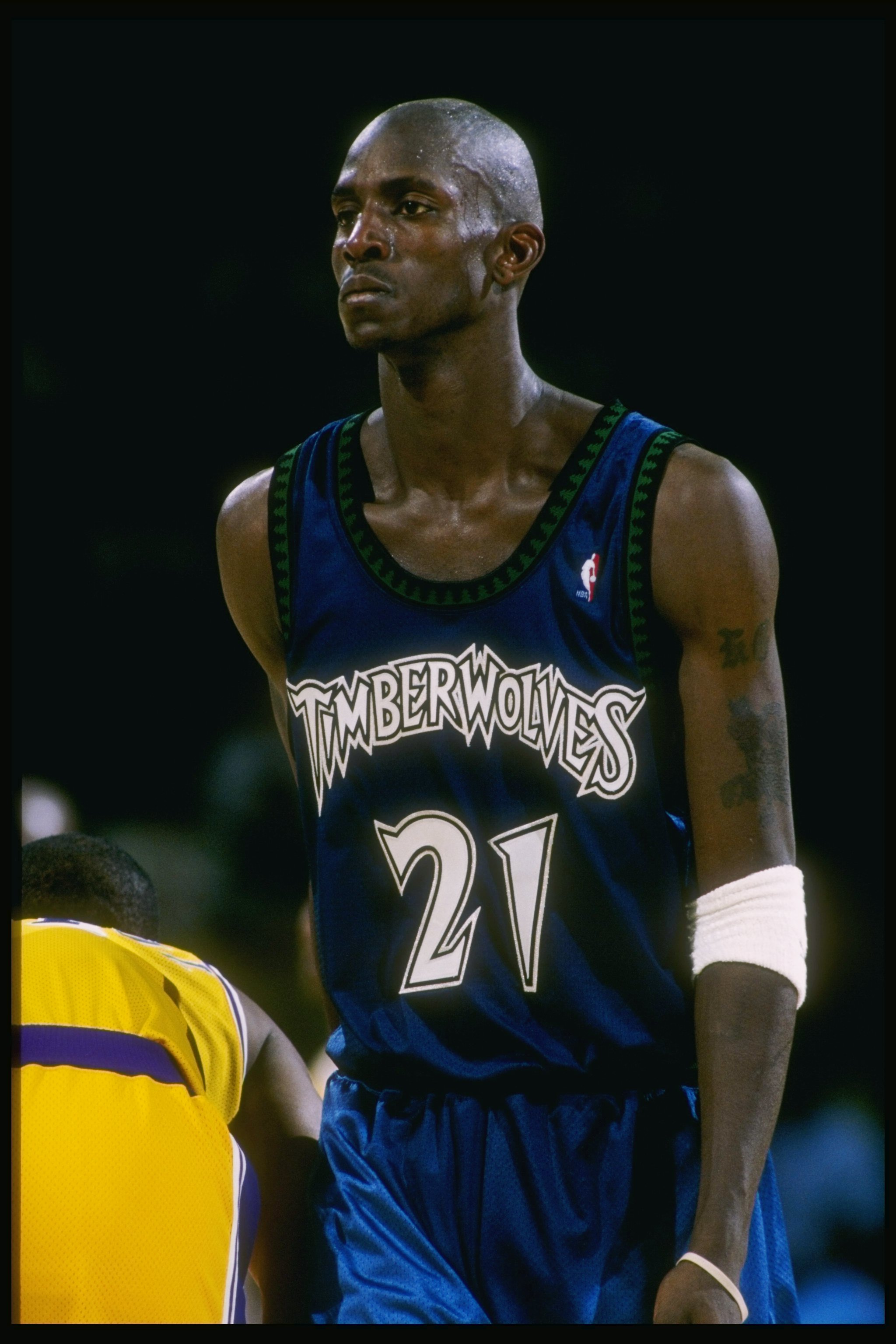 19 Nov 1997:  Forward Kevin Garnett of the Minnesota Timberwolves looks on during a game against the Los Angeles Lakers at the Great Western Forum in Inglewood, California.  The Lakers won the game 118-93. Mandatory Credit: Jed Jacobsohn  /Allsport