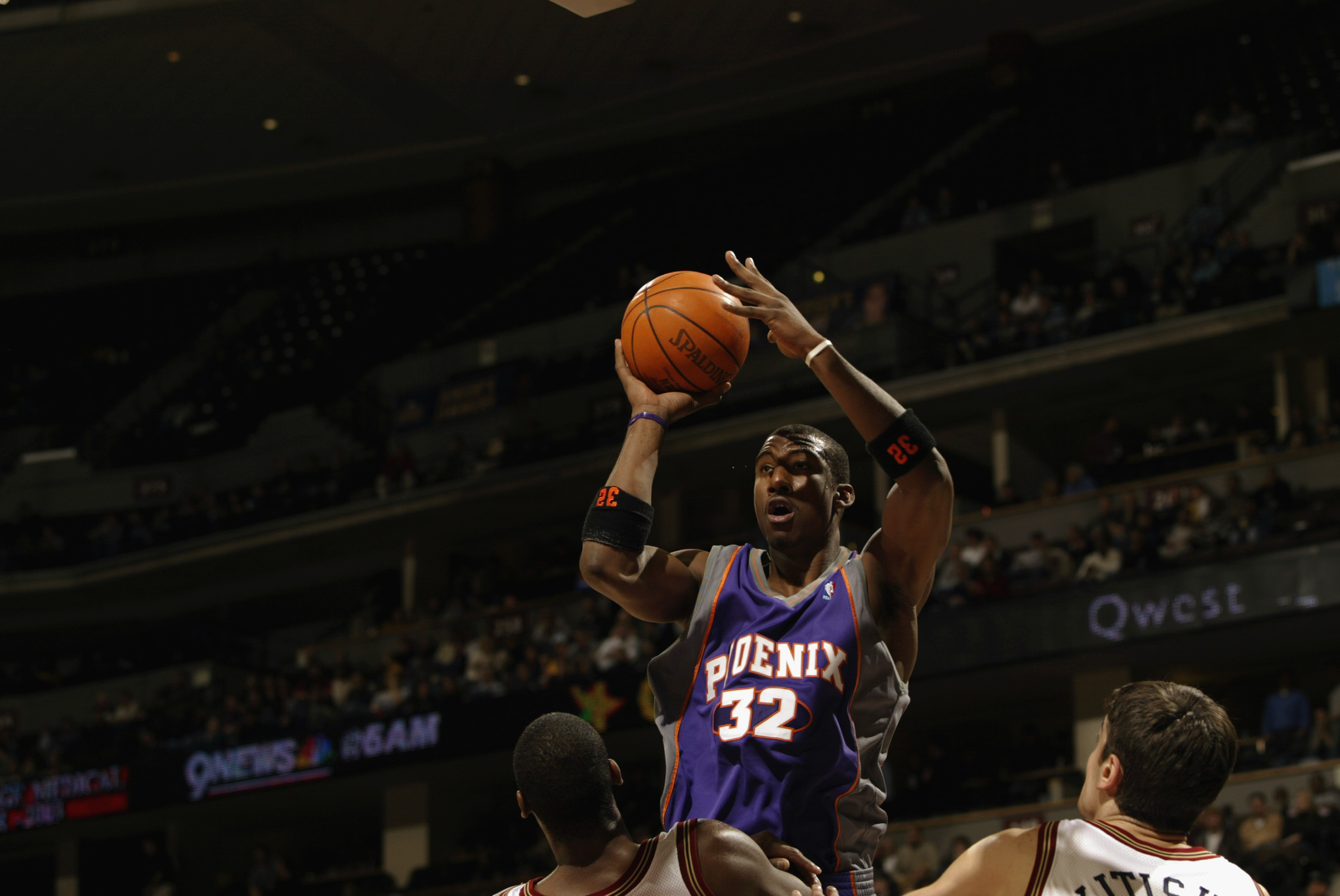 DENVER - NOVEMBER 13:  Amare Stoudemire #32 of the Phoenix Suns puts up a shot against the Denver Nuggets during the NBA game at Pepsi Center on November 13, 2002 in Denver, Colorado.  The Suns won 75-72.   NOTE TO USER: User expressly acknowledges and ag