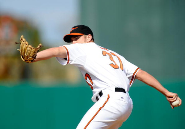 FORT LAUDERDALE, FL - FEBRUARY 26: Chris Ray #37 of the Baltimore Orioles pitches against the St Louis Cardinals during a spring training game at Fort Lauderdale Stadium on February 26, 2009 in Fort Lauderdale, Florida. (Photo by Rob Tringali/Getty Images