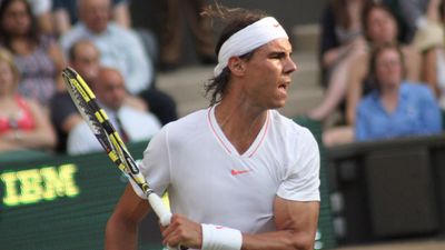 Rafael Nadal of Spain returns ball during second round match against Robin Haase of the Netherlands at Wimbledon in London, England on June 24, 2010