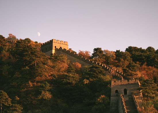 Moon rising over the Great Wall of China