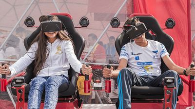 Children playing video games with virtual reality headsets in Bucharest, Romania gaming technology computer kids boy girl