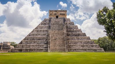 The Castillo, a Toltec-style pyramid, rises 79 feet (24 meters) above the plaza at Chichen Itza in Yucatan state, Mexico. The pyramid was built after invaders conquered the ancient Maya city in the tenth century.