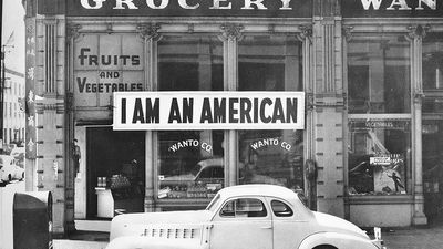 In 1942 the West Coast was swept by a wave of what approached hysteria over the presence of large numbers of Japanese-American. Sign on Japanese-American store in Oakland, Calif., 1942. Photograph by Dorothea Lange