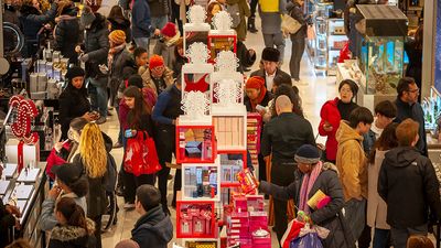 New York NY/ USA- November 23, 2018 Hordes of shoppers throng the Macy's Herald Square flagship store in New York looking for bargains on the day after Thanksgiving, Black Friday.