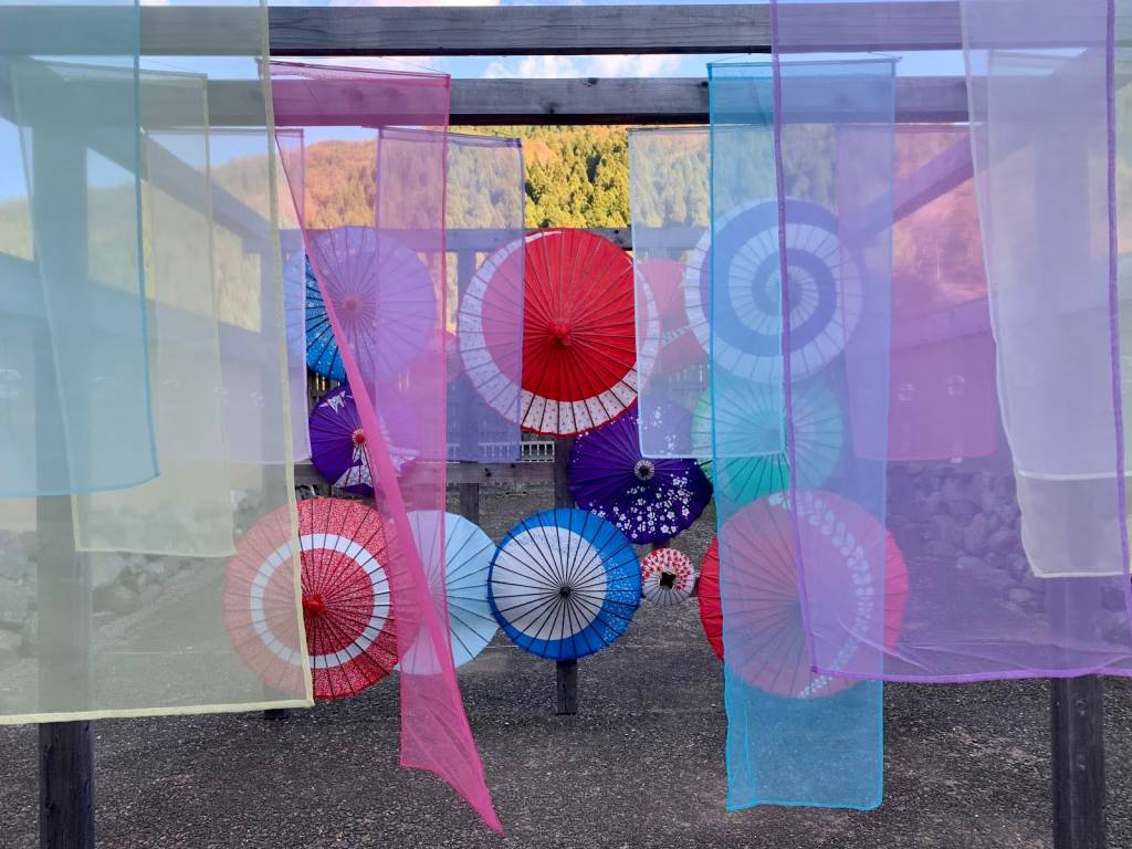 colorful cloths and umbrellas at the Ichijodani Asakura Clan Ruins in Fukui