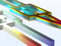 A close-up view of two tuning fork models.