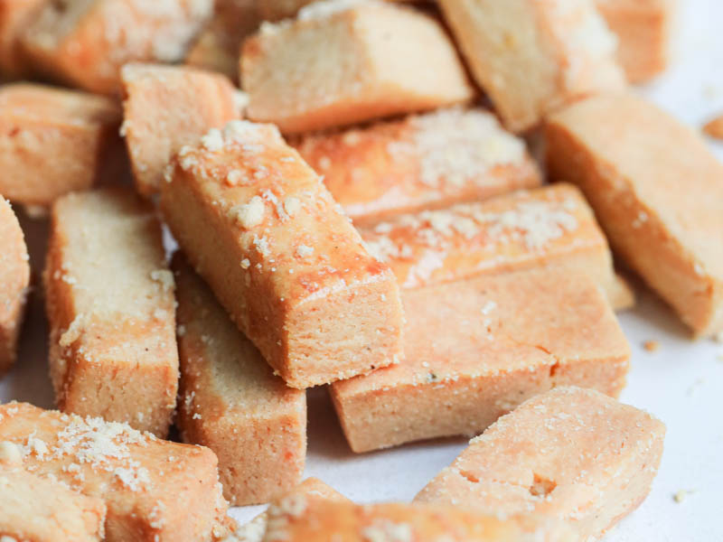 The parmesan cheese cookies arranged in an irregular maner.