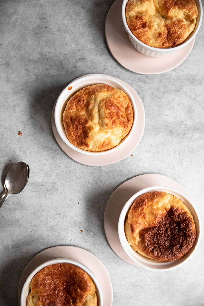 Overhead shot of 4 cheese souffles disposed in a snake form