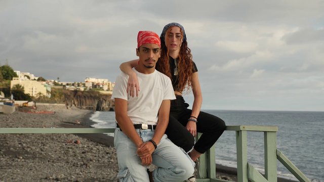 Couple posing on the pier