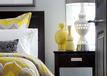 Bedding-and-vases-add-pops-of-yellow-to-the-gray-bedroom-217x155