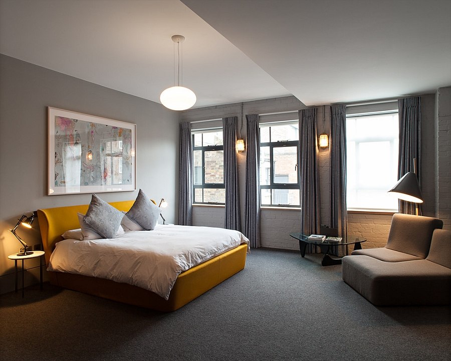 Contemporary bedroom with a colorful bed in yellow [From: Peter Landers Photography]