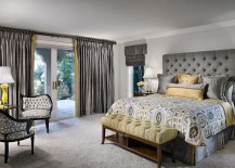 Tufted-headboard-and-silken-drapes-give-the-room-an-air-of-luxury-217x155