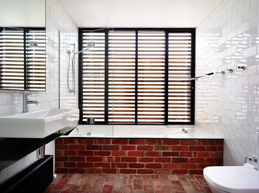 Fun way to showcase exposed brickwork in the modern bathroom [Design: Wolveridge Architects]