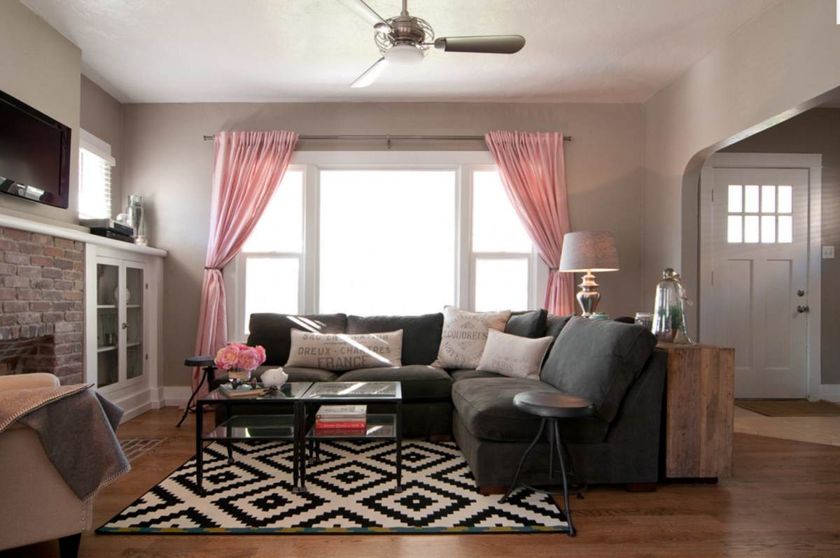 Taupe living room with pink accents