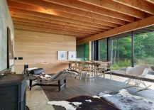 Iconic-mid-century-decor-and-lounger-inside-the-holiday-cabin-217x155