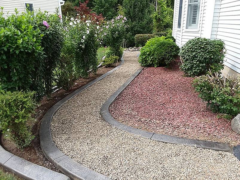 Concrete edging and stone pathway