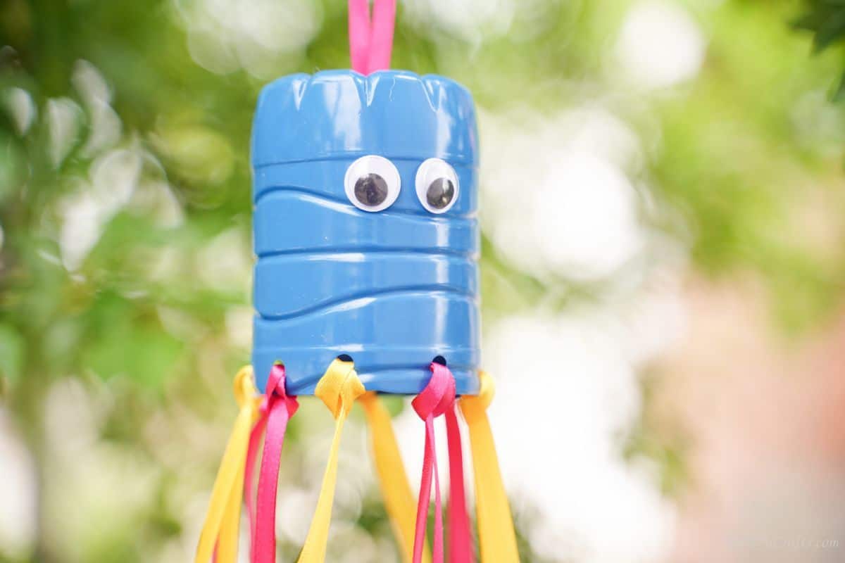 close up of face on blue top of windsock