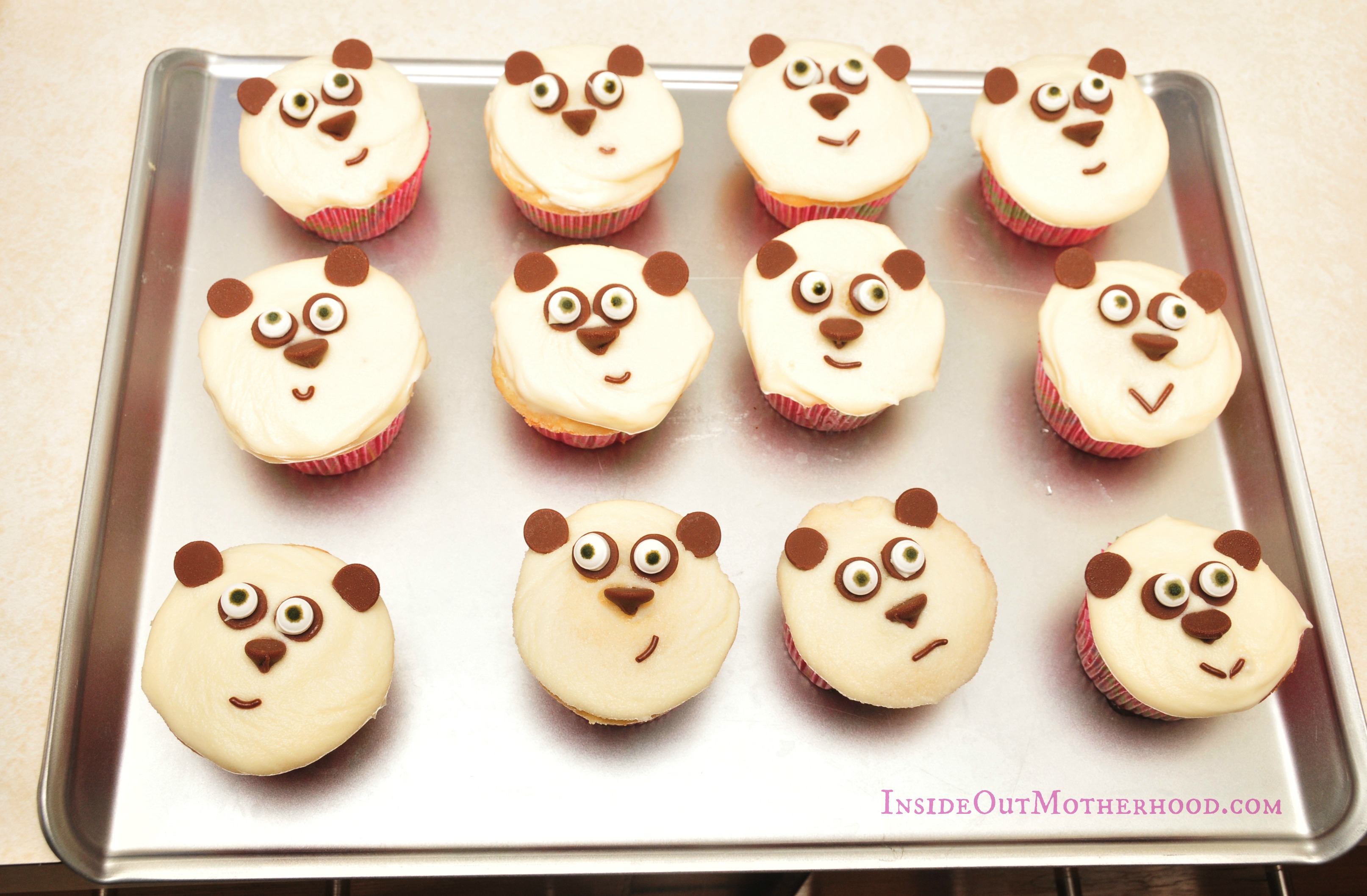 Panda cupcakes on cookie sheet