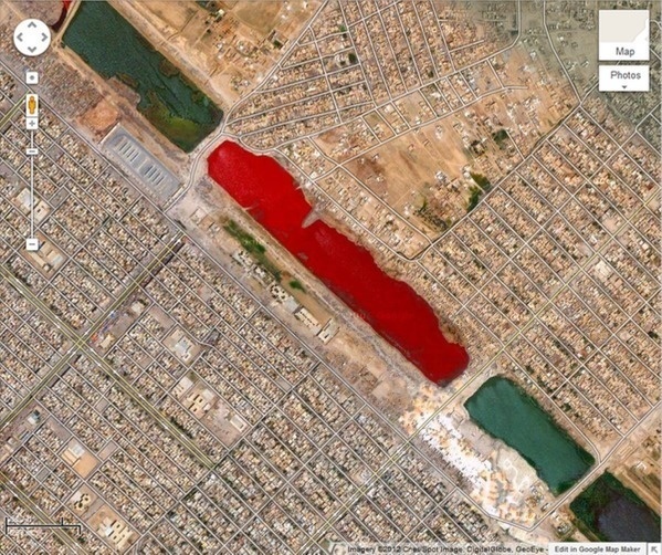 Then there's the pesky issue of this lake.

Sadr City in Iraq has a blood-red lake that no one can explain. It looks like a building, but nope. You could go swimming in there.