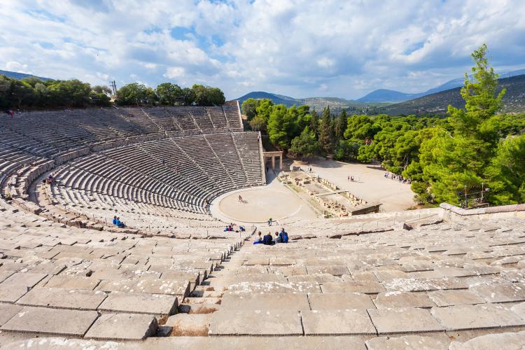 The Epidaurus Ancient Theatre is dedicated to the ancient Greek God of medicine, Asclepius. – © saiko3p / Shutterstock