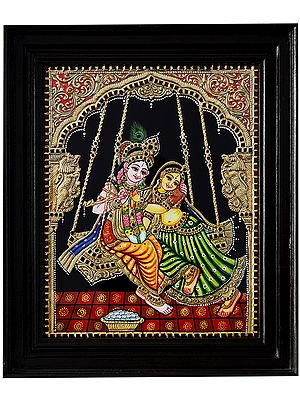 Deities Radha Krishna on Swing | Tanjore Painting with Frame | Traditional Color with 24 Karat Gold