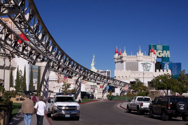 A snap shot of a city road with a tower in the back ground