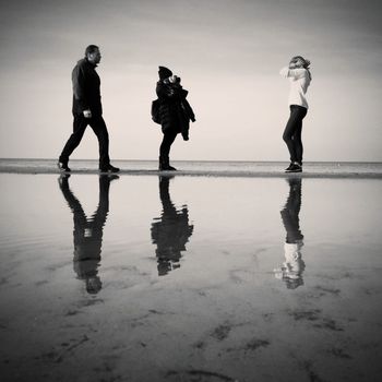 WOMAN STANDING ON SHORE