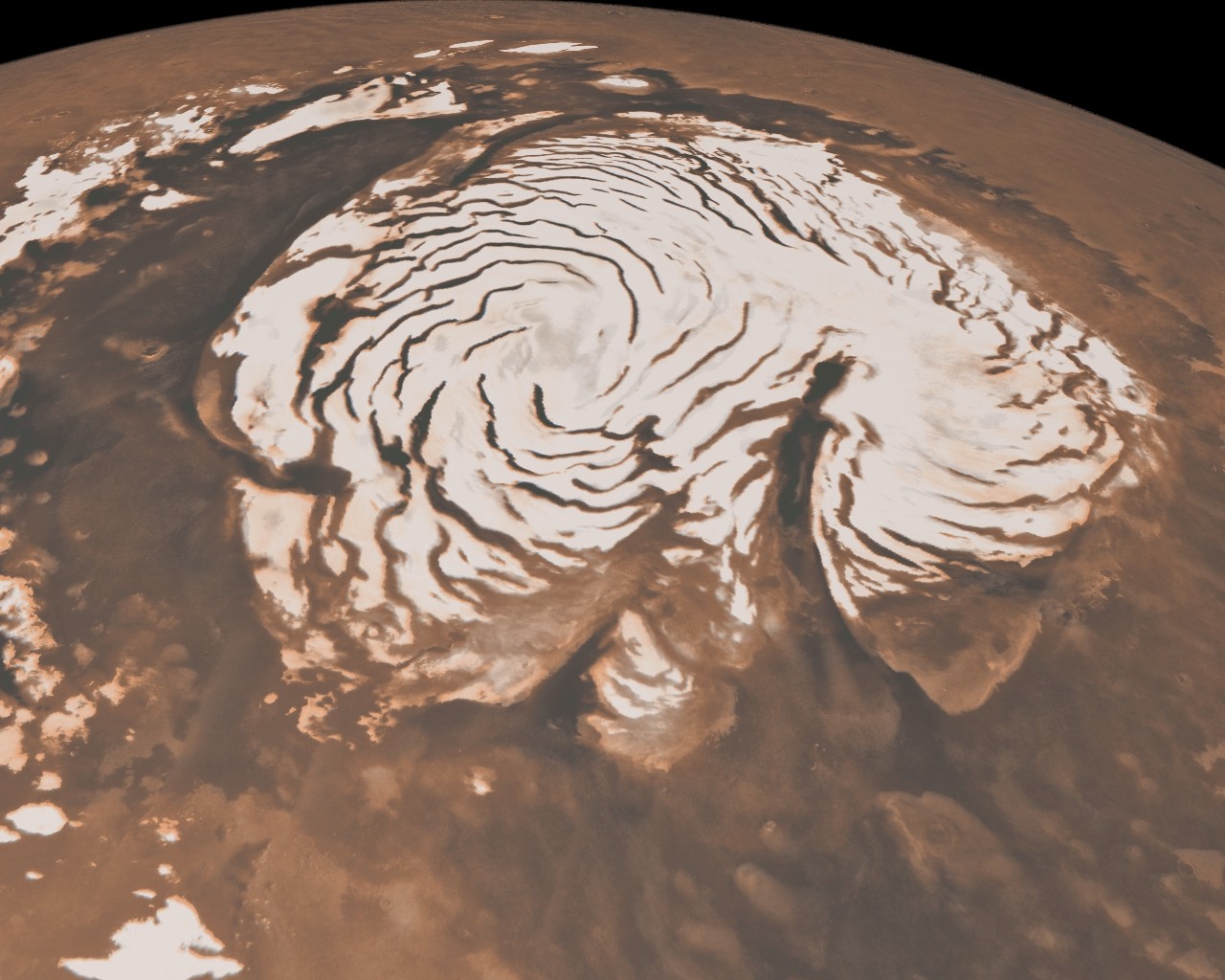 L'étrange aspect de la calotte polaire martienne boréale s'explique désormais. Selon les relevés effectués par le radar Sharad à bord de la sonde MRO, c'est le vent qui est à l'origine des failles et canyons qui sculptent le manteau de glace. Crédit Nasa/JPL-Caltech
